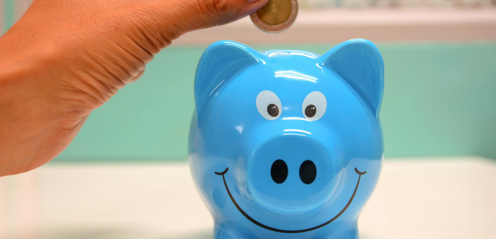 Une tirelire illustrant les économies et la gestion financière que Co-opt peut vous aider à mettre en place