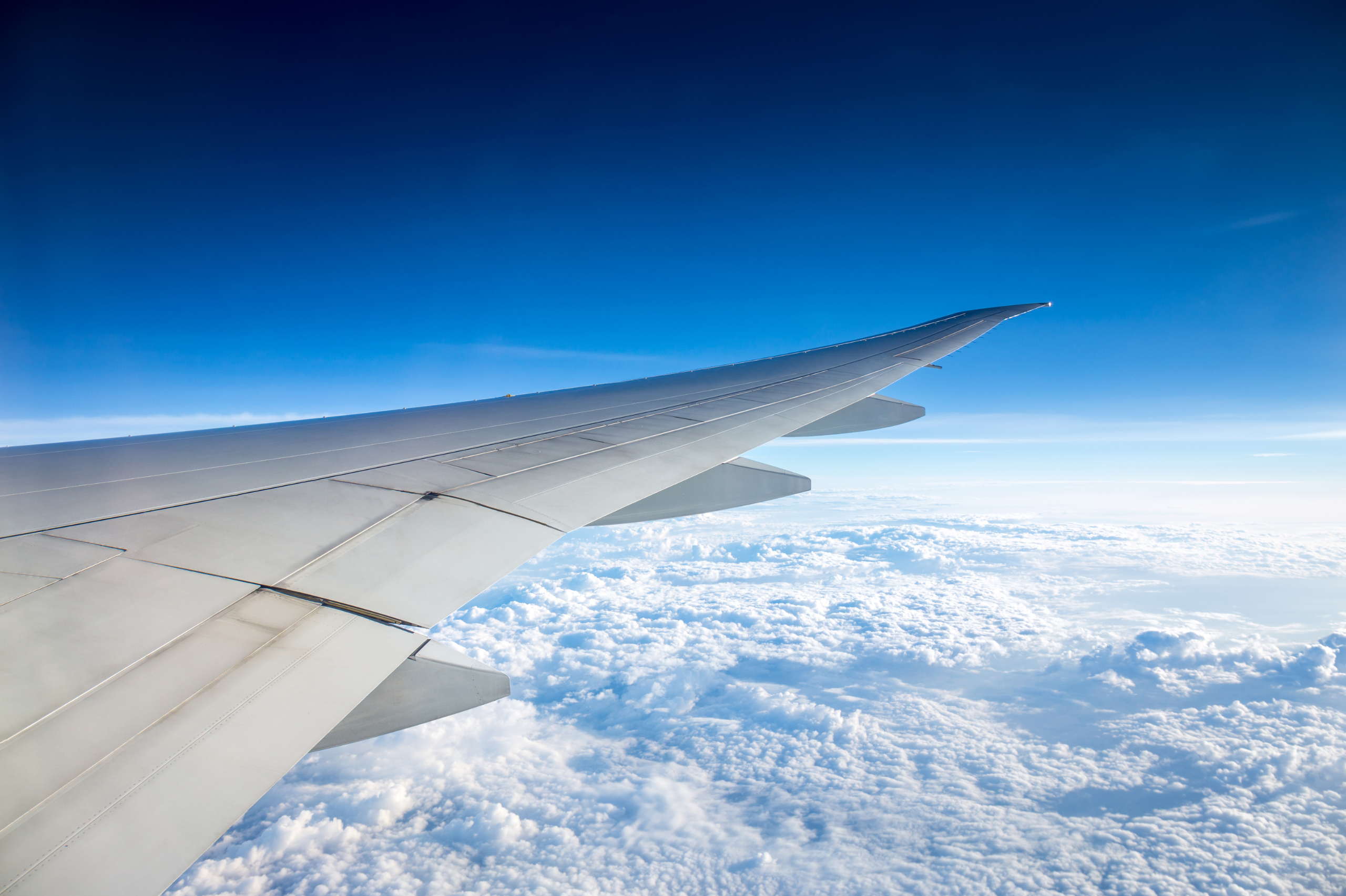 Avion qui représente l'accompagnement de Co-opt aux agences de voyage